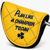 Angled view of a yellow quilted leather-style mallet putter headcover with shearling-lined opening and putter shaft showing, embroidered with Play Like A Champion Today. Studio product photo on white background - HeadCaddy